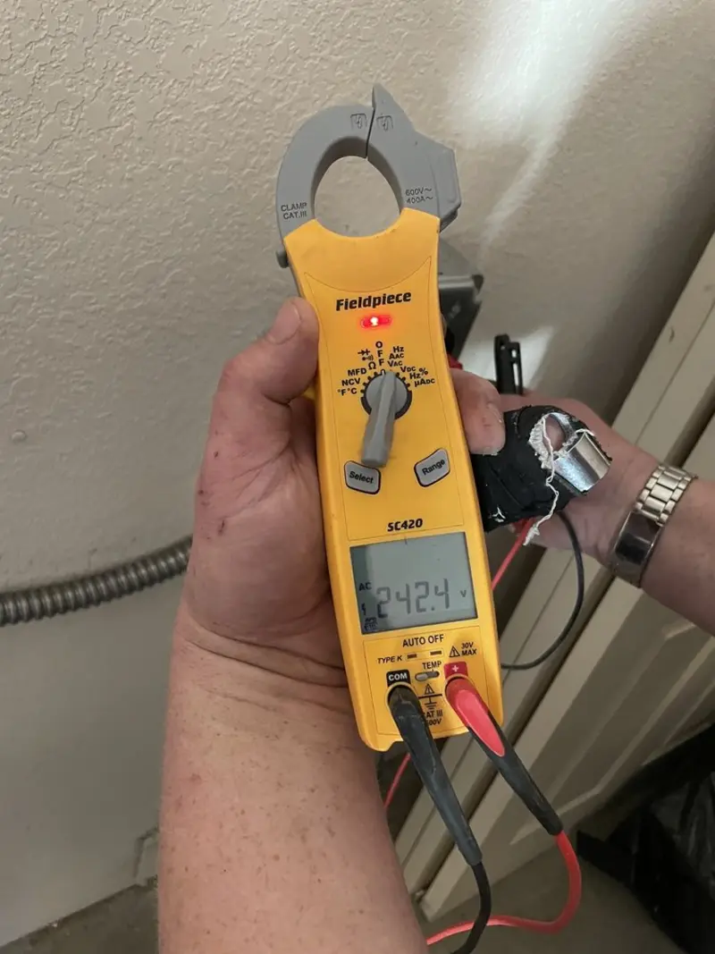 Voltage testing with clamp meter during Hot Tub / Pool Electrical Wiring in Berwick